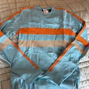 Cotopaxi Blue and Orange Debajo Seamless Base layer